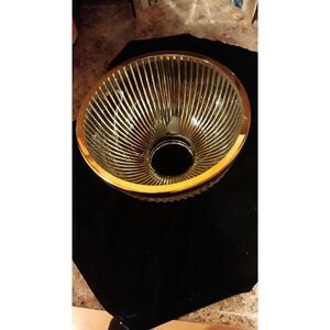 Glass lamp shade with brass cap on end 3.25 diam opening at base. in good condit